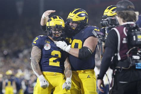 Michigan beats Alabama 27-20 in overtime at the Rose Bowl, advances to CFP championship game